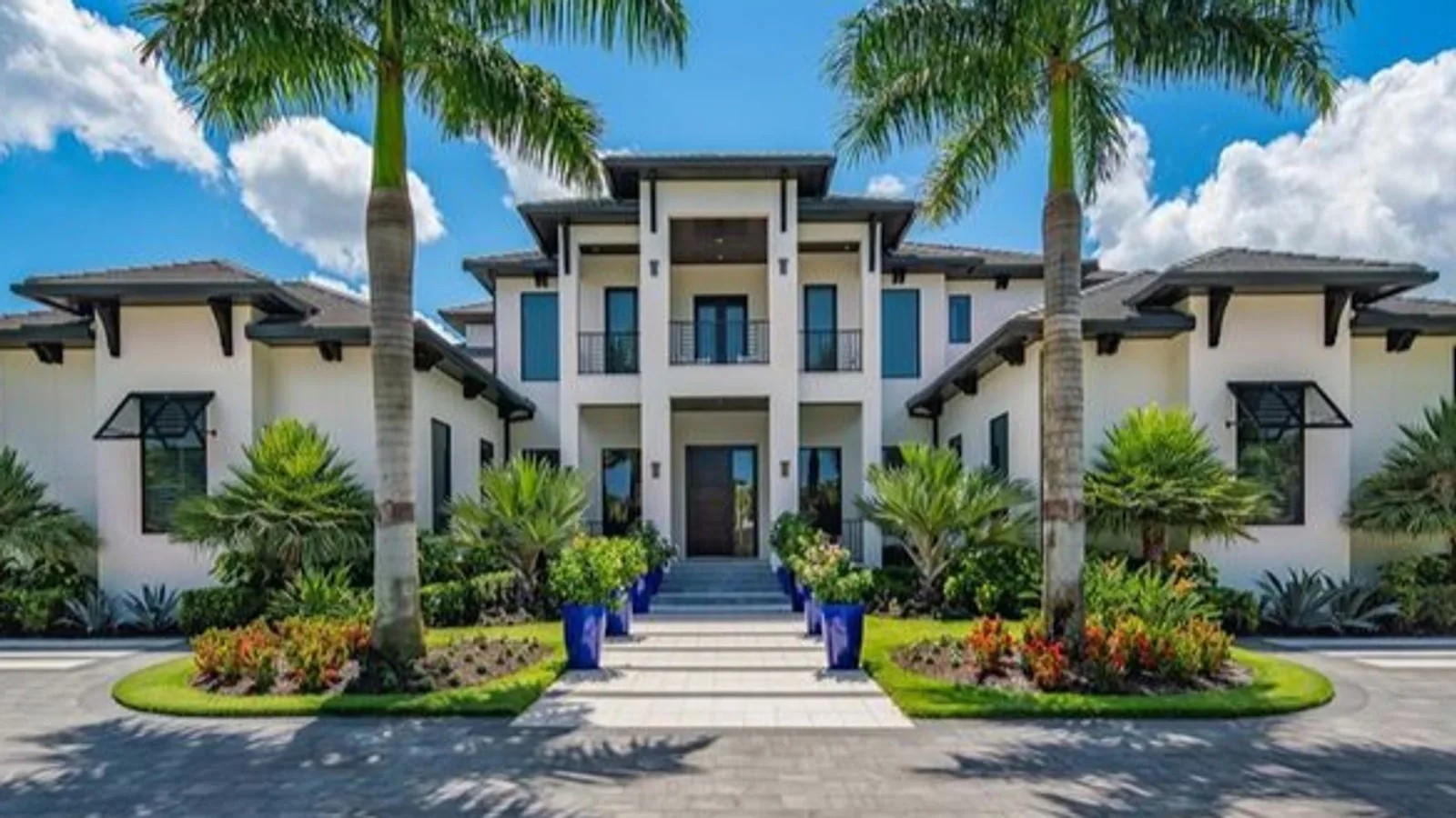 Luxury waterfront property overlooking Sarasota Bay at sunset