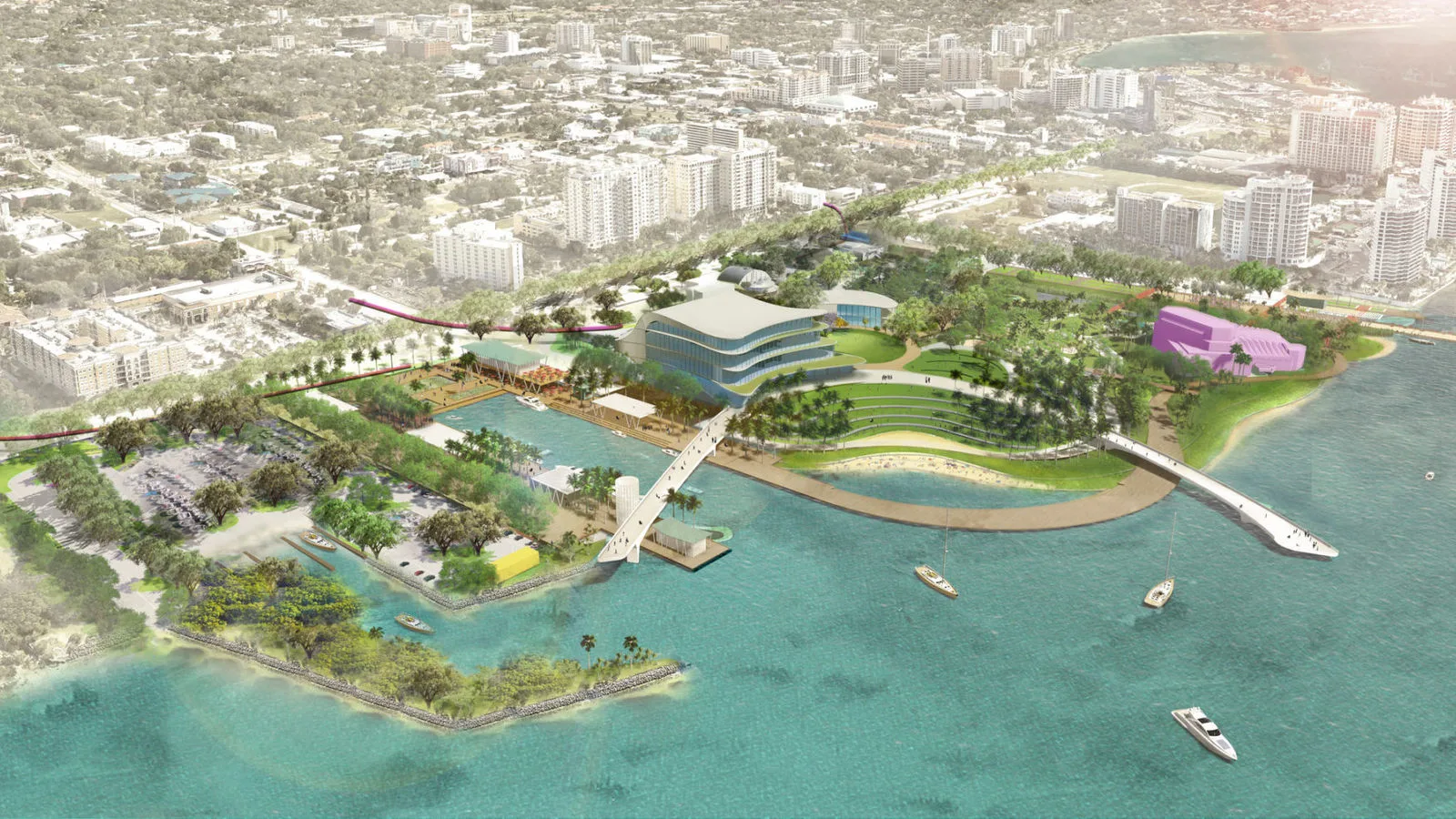 Aerial rendering of The Bay Sarasota waterfront park with modern buildings, bridges, sailboats, and the city skyline